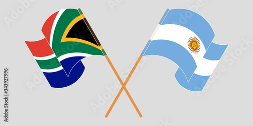 Crossed and waving flags of RSA and Argentina