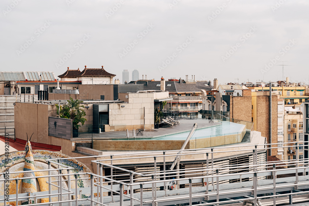 Rooftop pool. View from a nearby building onto the roof of the house on which the pool is located.