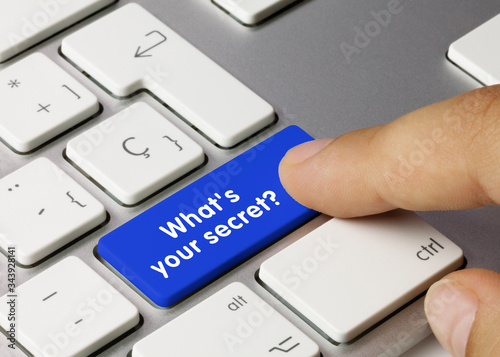 What s your secret  - Inscription on Blue Keyboard Key.