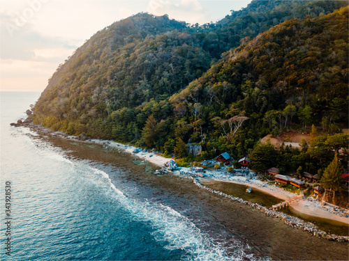 Aerial view of coastal with resorts and sandy beach in Lampuuk, Aceh, Indonesia. photo
