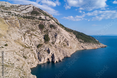 Aerial view of popular landmark Vruja near Makarska with Biokovo mountain and Adriatic sea, Croatia. photo