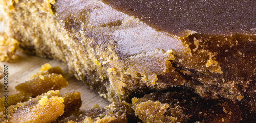Sweet made with sugar cane, molasses or brown sugar. Consumed throughout Latin America, called rapadura, pan, chancaca, empanizao, piloncillo and papelón.