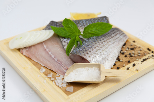 mullet fresh fish on a cutting board