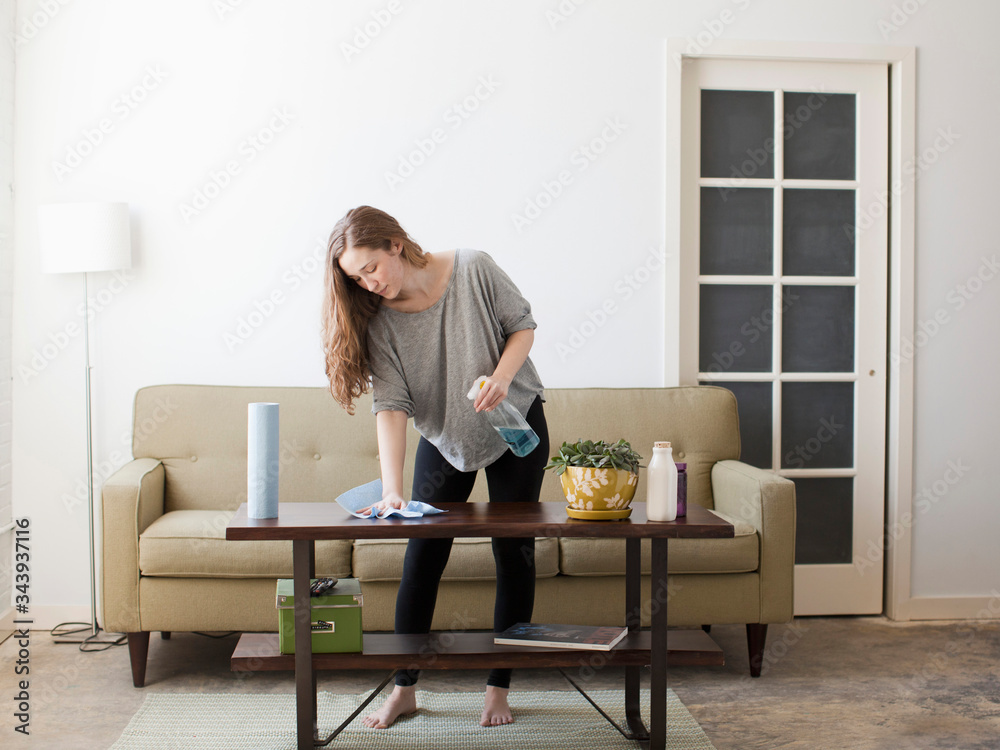 Young woman cleaning