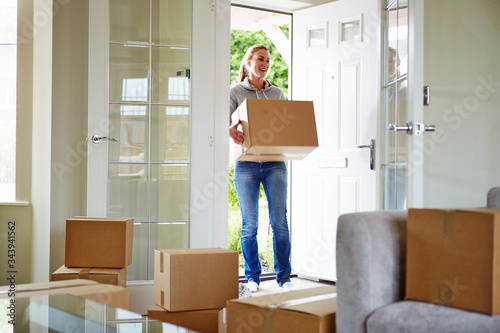 Young woman moving to a new house