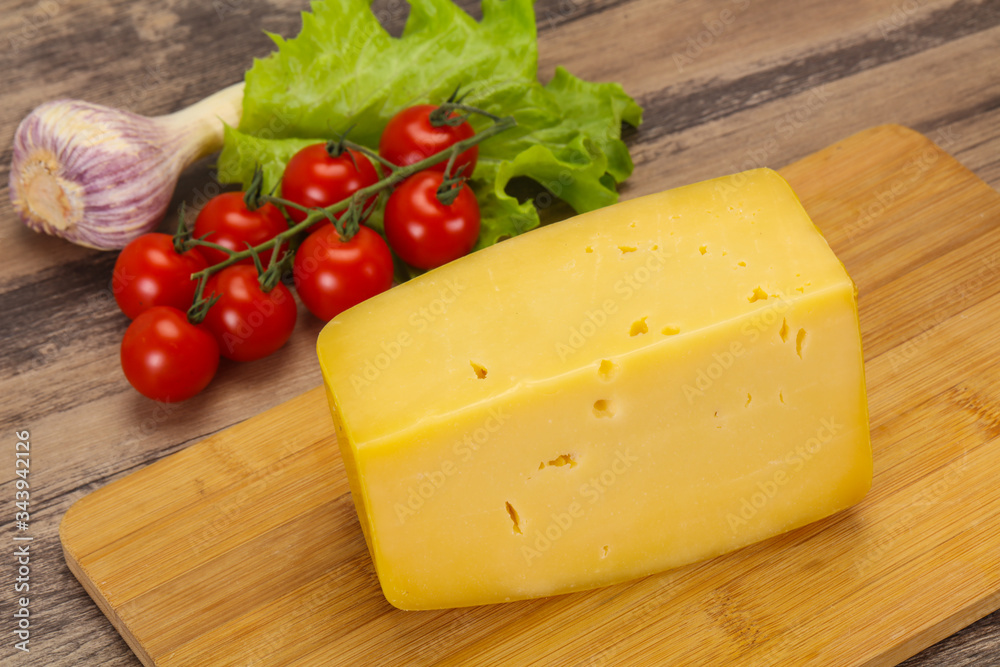 Hard yellow tasty cheese brick Hard yellow tasty cheese brick