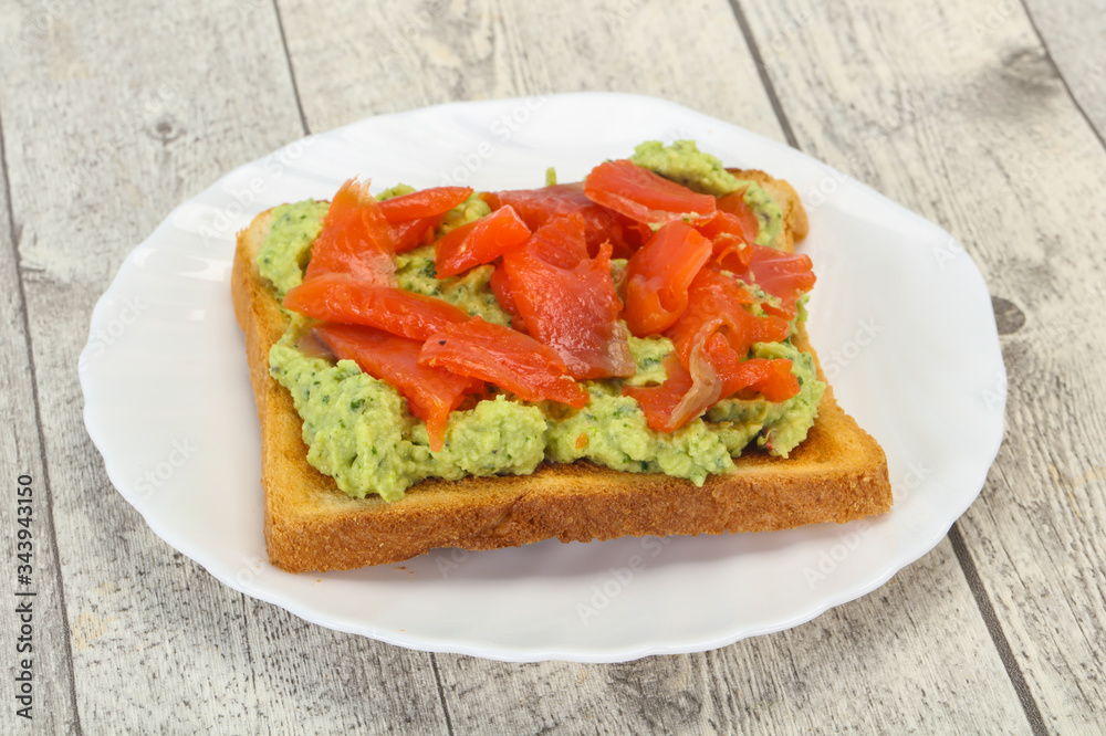 Toast with guacamole and salmon