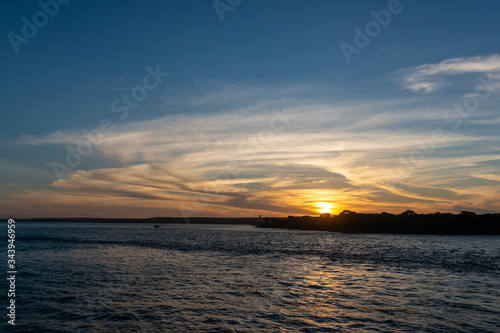 Sunset at Guarairas lagoon, Tibau do Sul, near Pipa beach and Natal, Rio Grande do Norte, Brazil on April 19, 2015