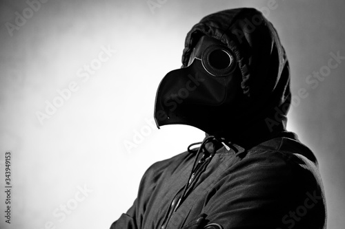 Actress in the mask of the plague doctor.