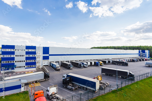modern logistics center with different cargo truck
