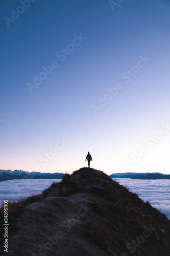 man on the top of the mountain