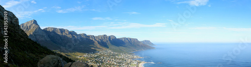 Panorama of Cape Town's Camps Bay district and beaches with a view on twelve apostles mountain range at TableMountain national park photo