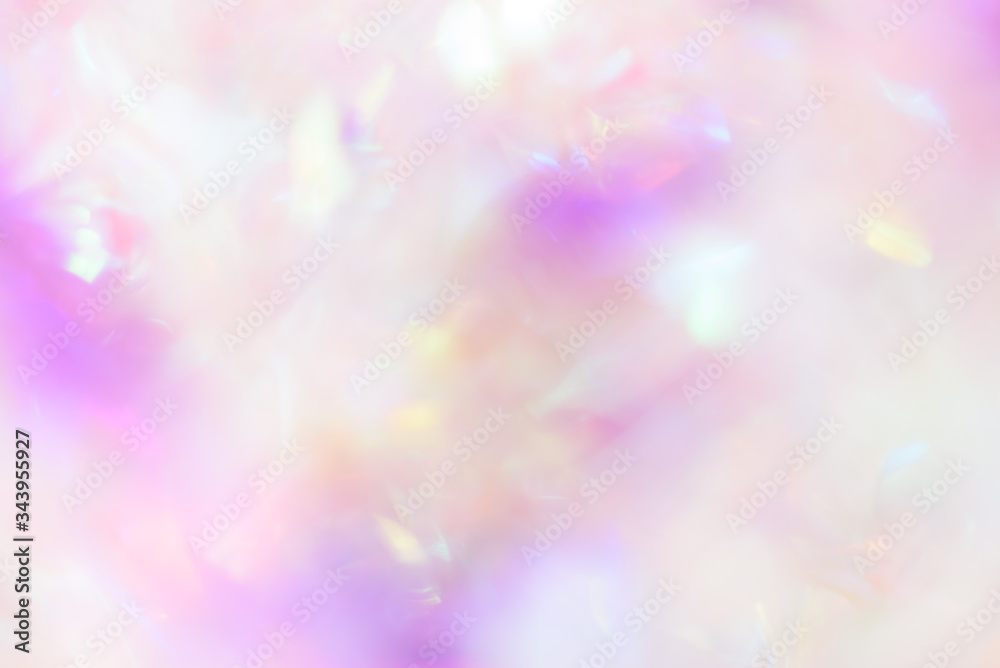 Abstract blurred rainbow glitter background. Bright and colorful background.