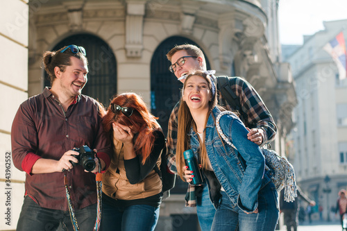 Group of tourists sightseeing the city