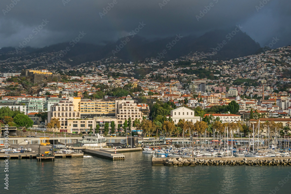 Fototapeta premium Funchal bay and Avenida do Mar with the buildings of the Marina Shopping and Baltazar Dias Theatre in Madeira, Portugal