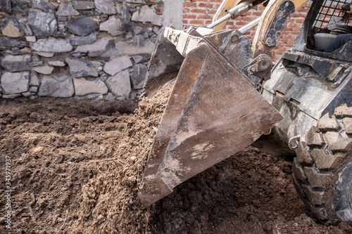 Excavator machine working on during a construction. photo