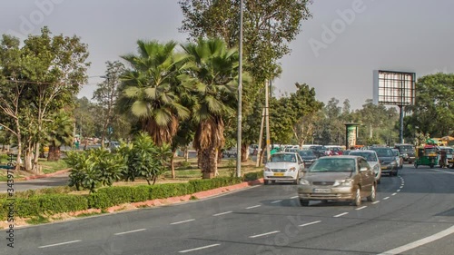 Heavy car traffic in the city center of Delhi, India.