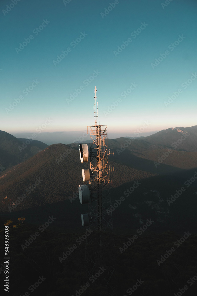 telecommunication tower on a hill