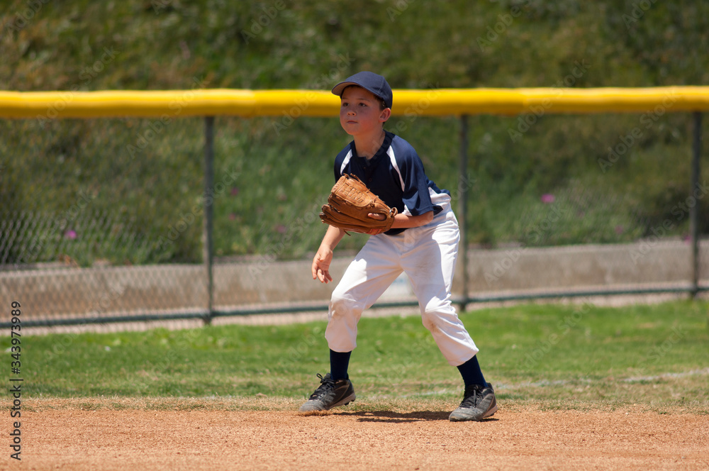 Little League baseball infielder ready for a ground ball Little League baseball infielder ready for a ground ball