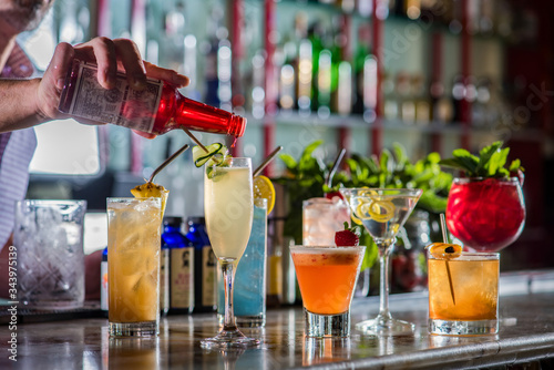 A Row of Colorful Cocktails photo
