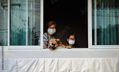 Mother and daughter with stay home during COVID-19 epidemic photo