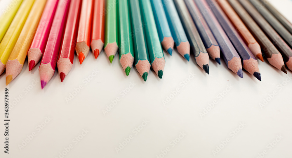 Color pencils isolated on white background. Close up. Color pencils isolated on white background. Close up.