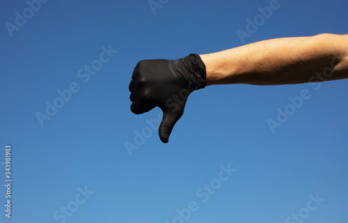 hand of a man No like. Gloves. Black gloves. Man hand. Male. 