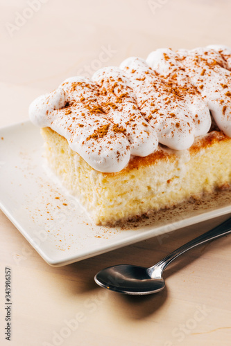 Tres leches cake, typical Latin American dessert, is made of condensed milk, evaporated milk and milk cream