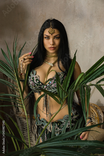Beautiful traditional female dancer. Oriental dancer woman. Belly dancing. ..