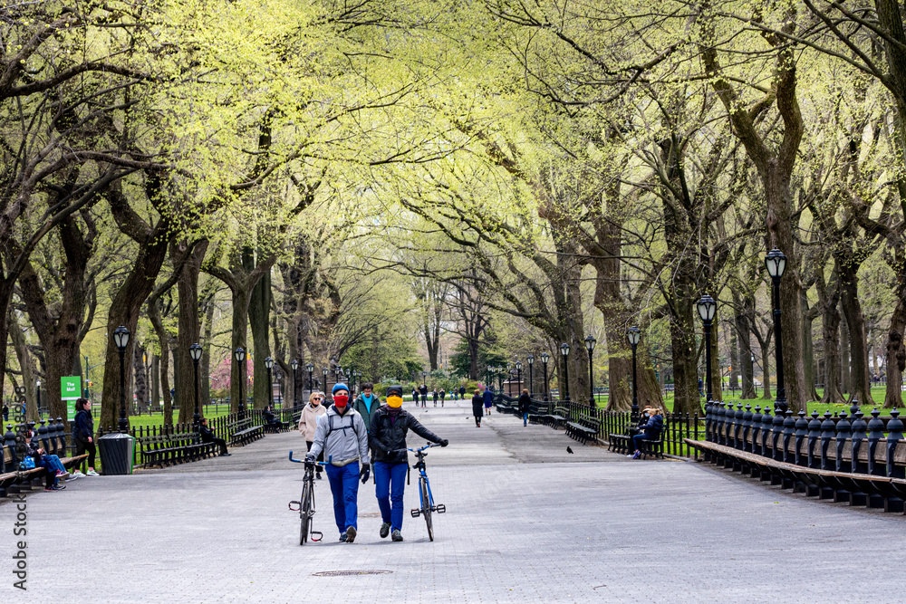 Manhattan, NY, USA- 4/17/20: people during the time of coronavirus in Central park