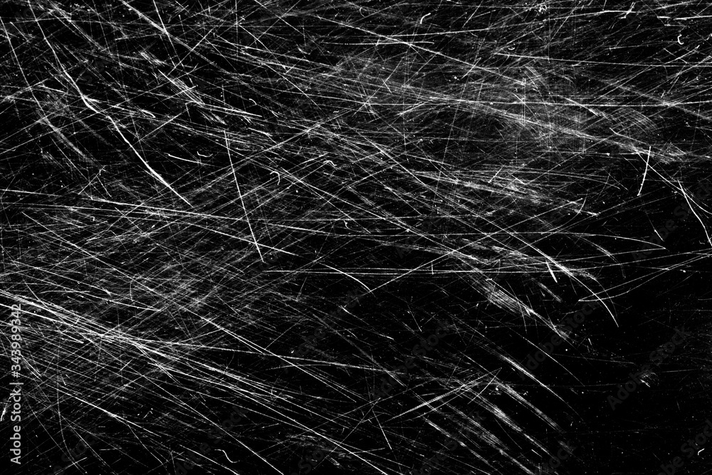 Fototapeta premium white scratches isolated on black background