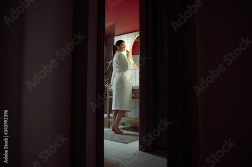 Woman doing beauty rituals at home stock photo