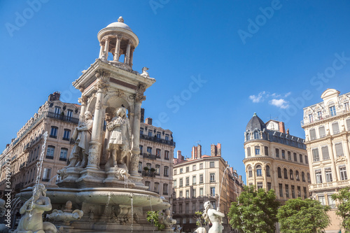 Place des Jacobins Square in Lyon with its iconic fountain from the 19th century. It is one of the main landmarks of the Old Lyon in the Presqu'Ile district