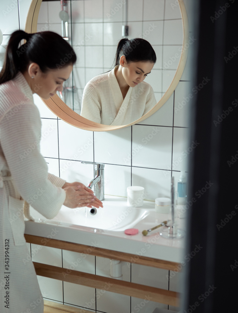 Woman taking care of hygiene at home stock photo Woman taking care of hygiene at home stock photo