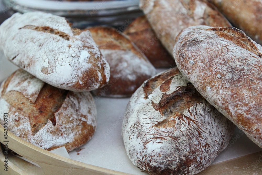 Handmade rustic bread in a tray