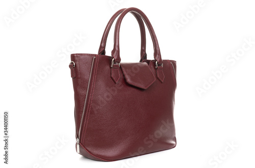 model of elegant leather women bag in red on a white background