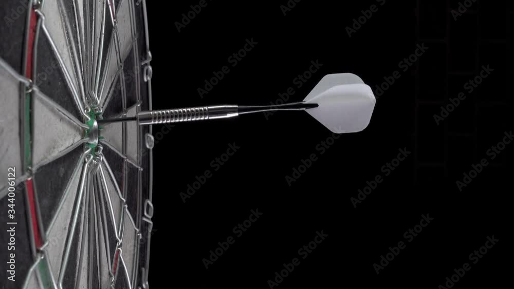 Throw three dart arrows at the dartboard.