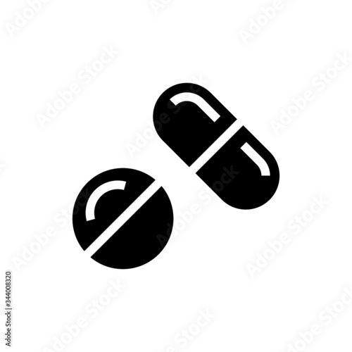 Tablet and capsule medications icon vector in black flat shape design isolated on white background