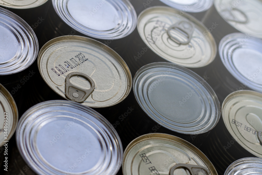 A neatly organised selection of un-labelled tinned foods. A neatly organised selection of un-labelled tinned foods.