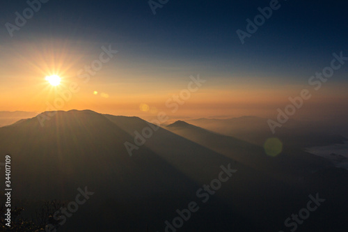 Panoramic scenery of mountains at sunset