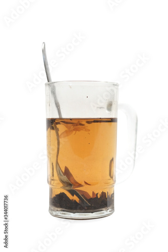 Big glass of hot brew tea isolated on white