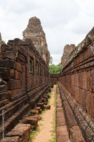 labyrinth in the leper king’s terrace, Angkor Wat complex, vertical photo in cloudy weather