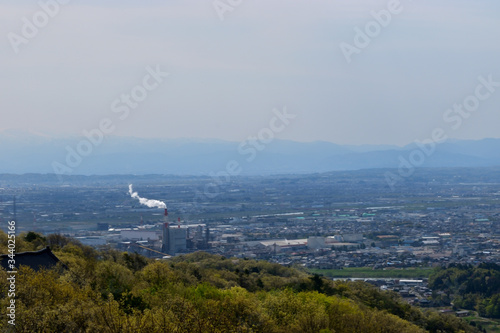 Image of City view and chimney from the hill