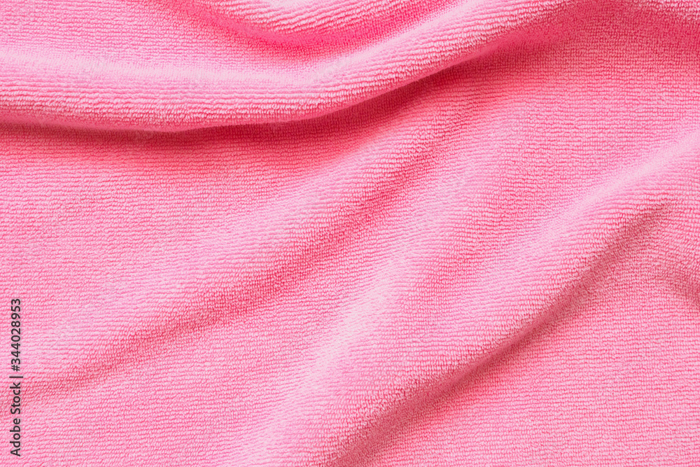 Pink towel fabric texture surface close up background Pink towel fabric texture surface close up background