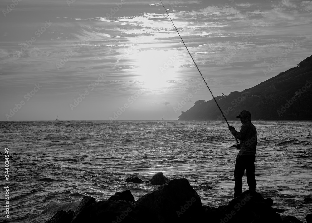Shoreline fishing on the beach
