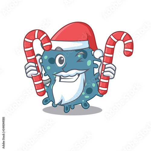 Friendly rickettsia in Santa Cartoon character holds Christmas candies photo