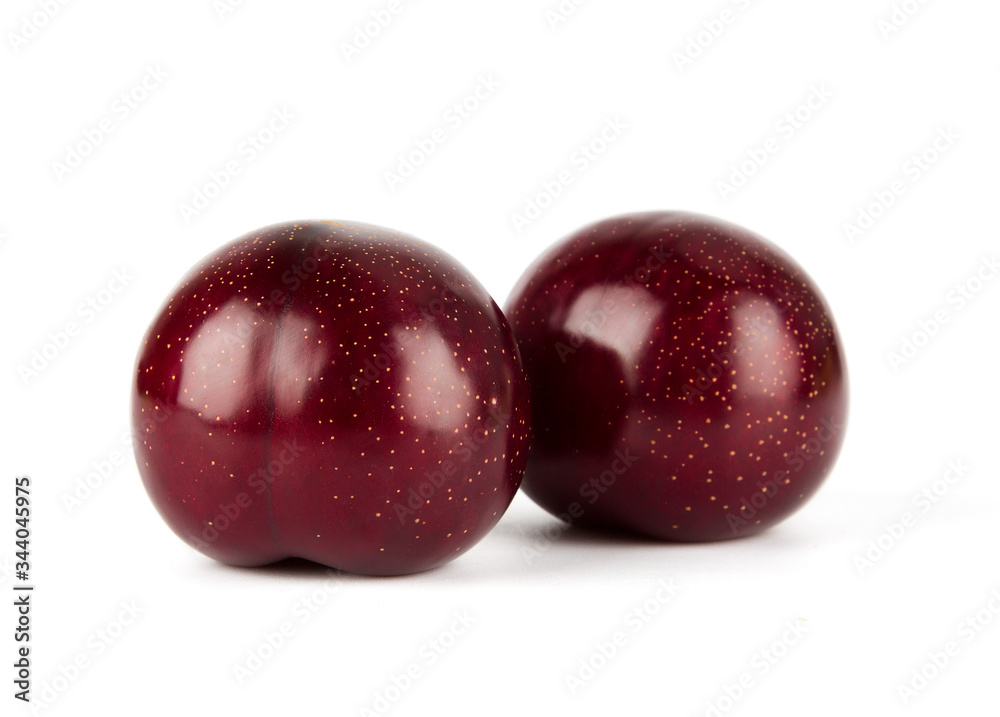 Fresh America red plum isolated on white background. Fresh America red plum isolated on white background.