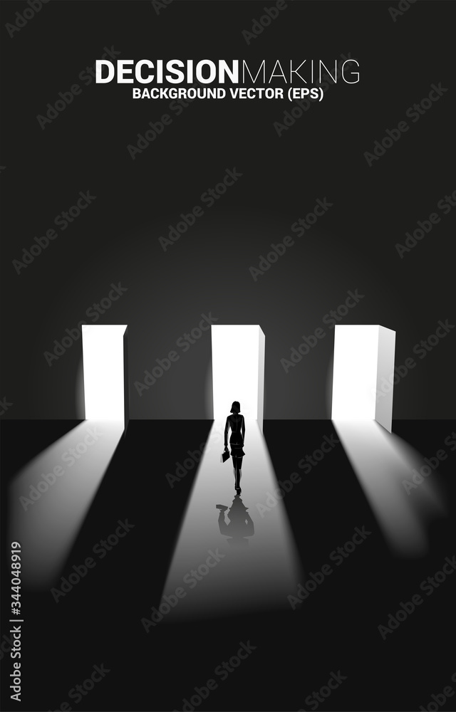 Obraz premium time to make decision in business direction. Silhouette of businesswoman standing to select door to enter