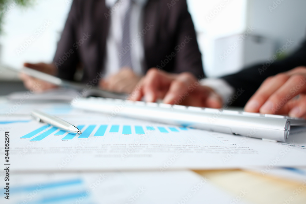 Fototapeta premium Financial statistics documents ball pen infographics at office table closeup. Internal Revenue Service inspector sum check investigation exchange market earnings savings loan and credit concept