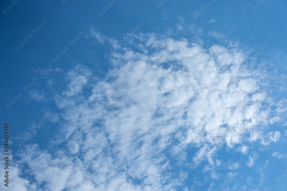 White clouds isolated in a clear cold blue sky on the Highveld of South Africa image for background use